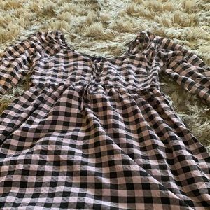 Lavender and black plaid off the shoulder midi dress.